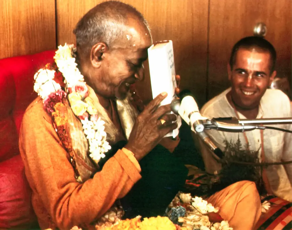 Srila Prabhupada With Book