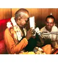 Srila Prabhupada With Book