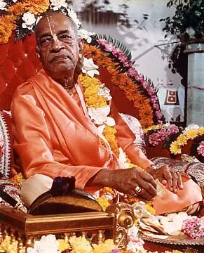Srila Prabhupada at New Dwaraka, Holding Cookie on Vyasasana
